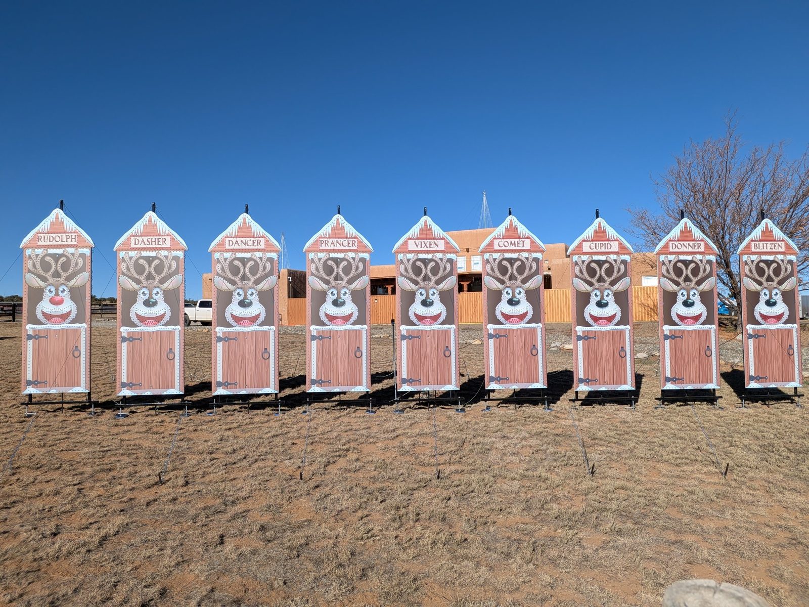 The nine reindeer boxes staged for setup