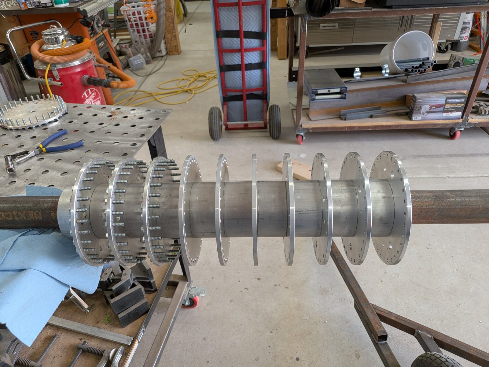 Flanges stacked on the center shaft