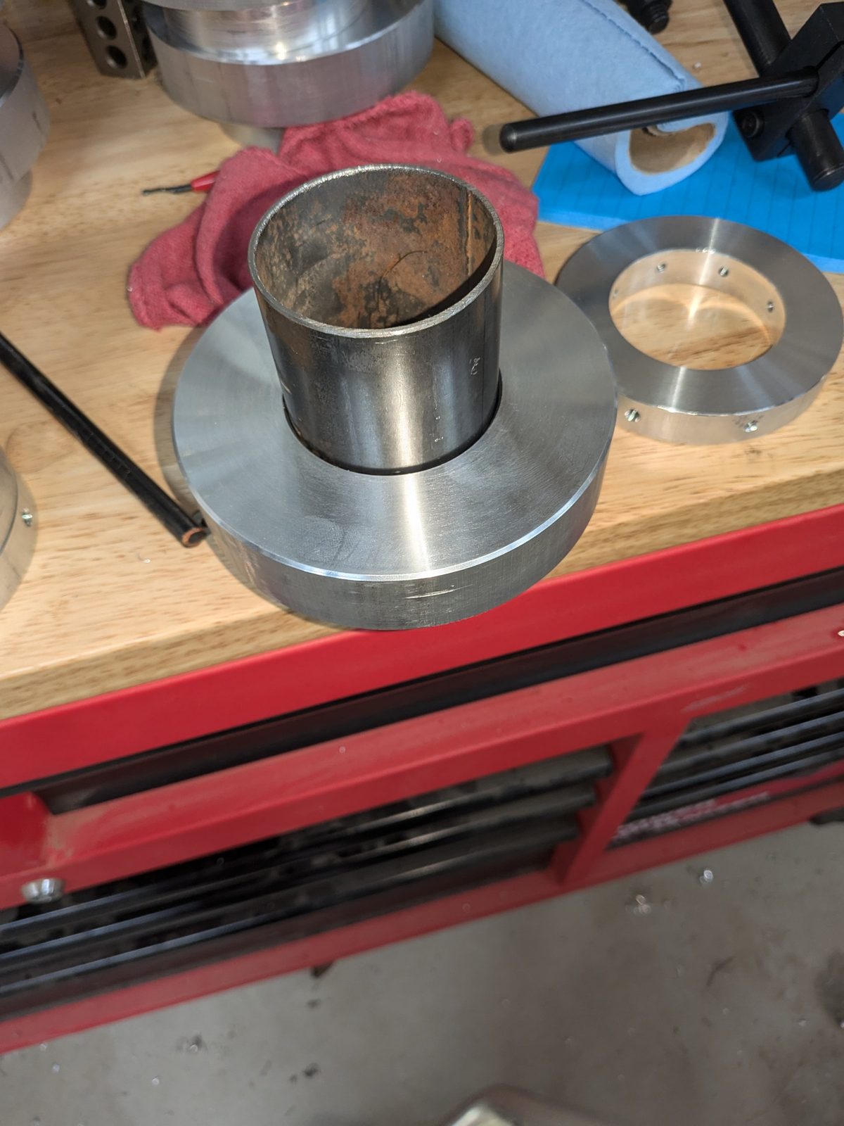 Steel bushing paired with its machined flange